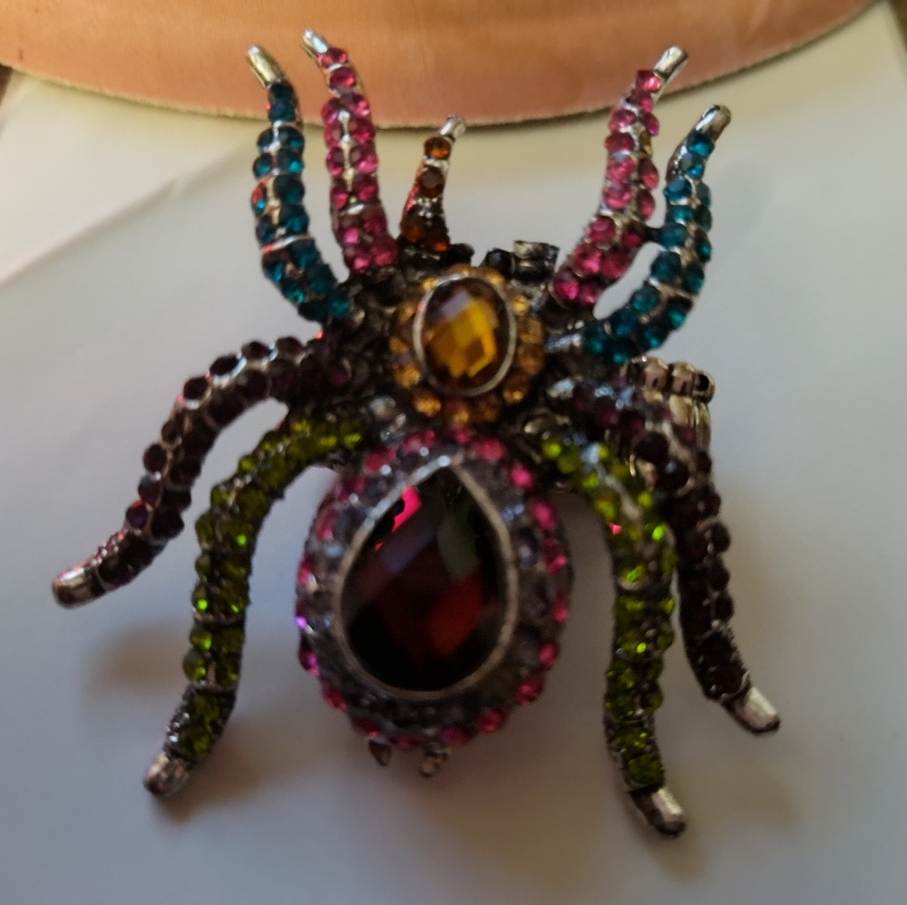 Pink and Green Crystal Ring with Intricate Detailing